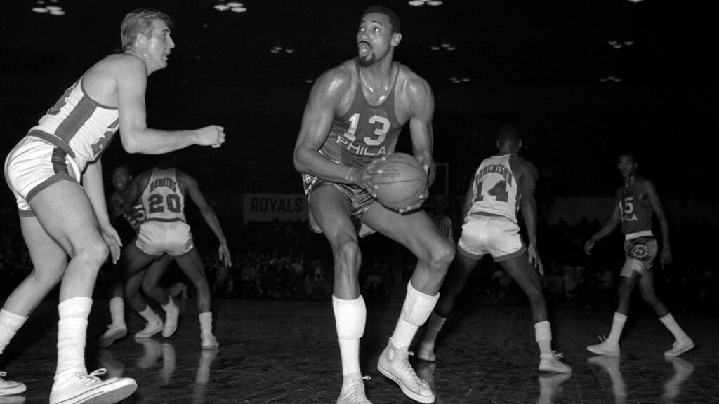 Unknown date; Cincinnati, OH, USA: FILE PHOTO; Philadelphia 76ers center Wilt Chamberlain (13) is defended by Cincinnati Royals center Connie Dierking (24) at Cincinnati Gardens.