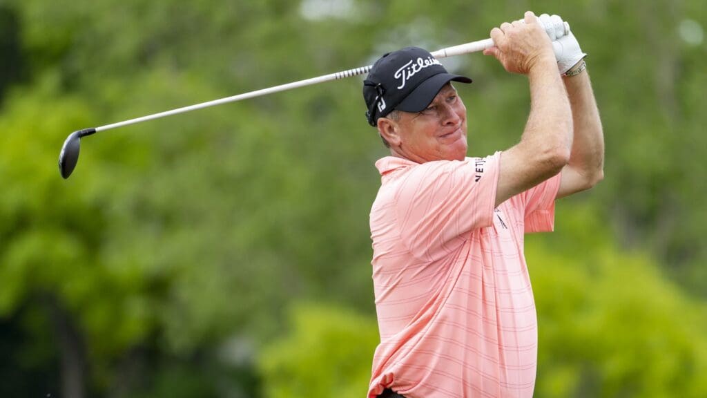 May 26, 2022; Benton Harbor, Michigan, USA; Woody Austin hits his tee shot on the eighth hole during the first round of the 2022 KitchenAid Senior PGA Championship at Harbor Shores.