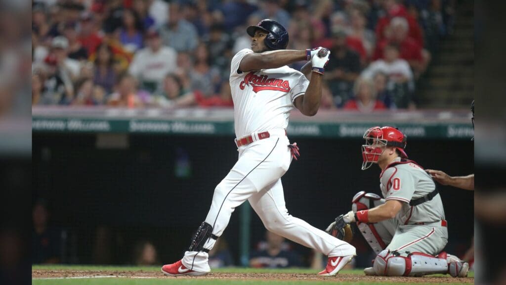 Sep 22, 2019; Cleveland, OH, USA; Cleveland Indians right fielder Yasiel Puig (66) singles against the Philadelphia Phillies during the fourth inning at Progressive Field.