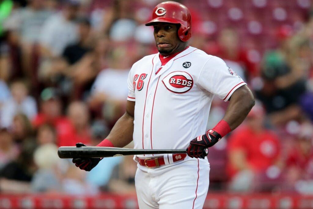 Cincinnati Reds right fielder Yasiel Puig (66) reacts after a pitch in the first inning of an MLB baseball game against the Colorado Rockies, Friday, July 26, 2019, at Great American Ball Park in Cincinnati. Colorado Rockies At Cincinnati Reds July 26
