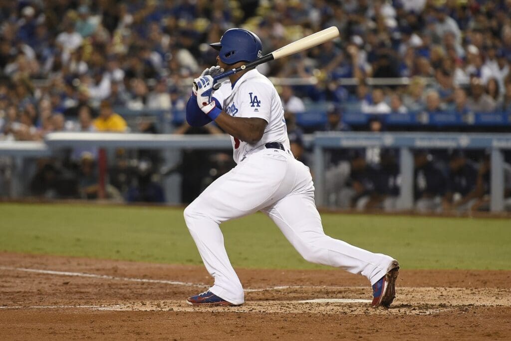 Sep 27, 2017; Los Angeles, CA, USA; Los Angeles Dodgers right fielder Yasiel Puig (66) looks up after hitting an RBI single during the third inning against the San Diego Padres at Dodger Stadium.