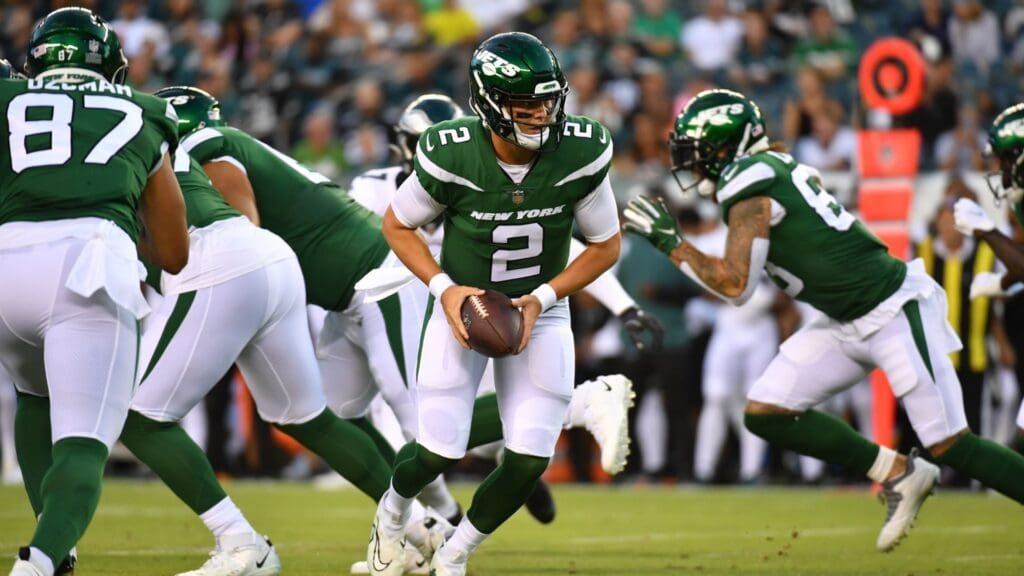 Aug 12, 2022; Philadelphia, Pennsylvania, USA; New York Jets quarterback Zach Wilson (2) hands off against the Philadelphia Eagles at Lincoln Financial Field.