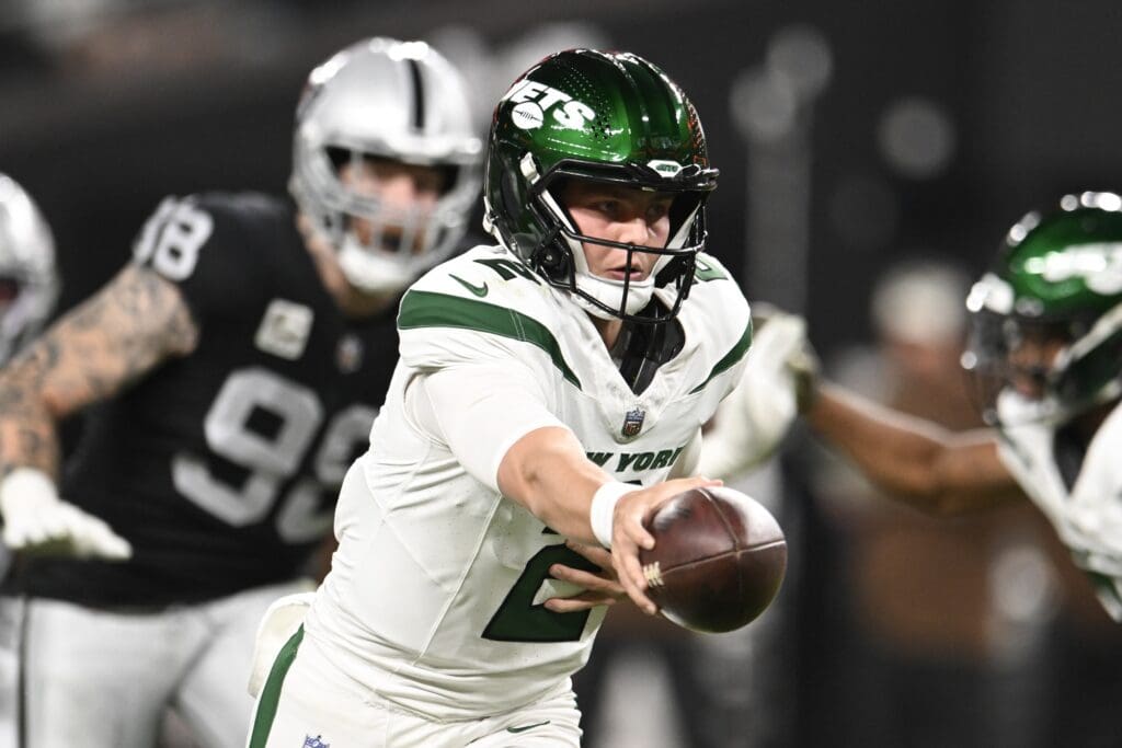Nov 12, 2023; Paradise, Nevada, USA; New York Jets quarterback Zach Wilson (2) looks to hand off the ball against the Las Vegas Raiders in the first quarter at Allegiant Stadium.
