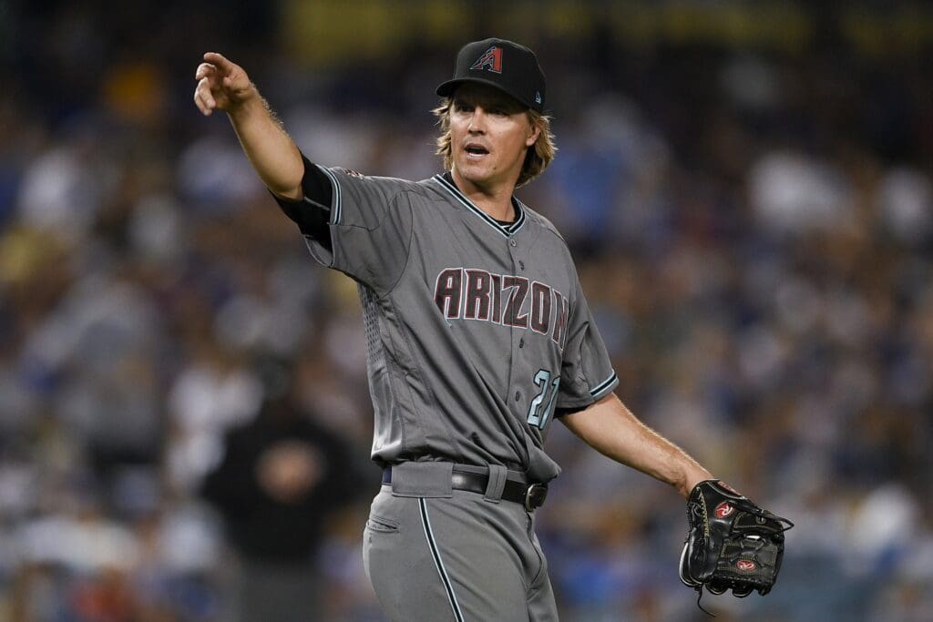 Aug 31, 2018; Los Angeles, CA, USA; Arizona Diamondbacks starting pitcher Zack Greinke (21) reacts after hitting Los Angeles Dodgers third baseman Justin Turner (not pictured) on a pitch during the fifth inning at Dodger Stadium.