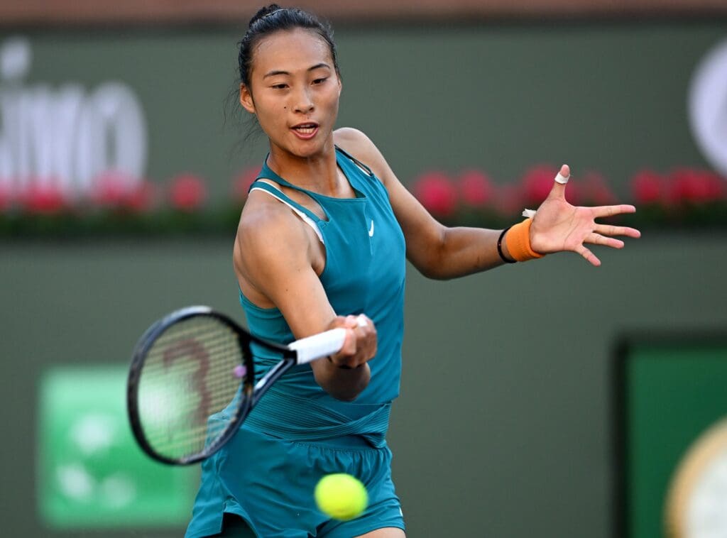 Mar 9, 2022; Indian Wells, CA, USA; Qinwen Zheng (CHN) hits a shot during her match against Vera Zvorareva (RUS) at the BNP Paribas Open at Indian Wells Tennis Garden