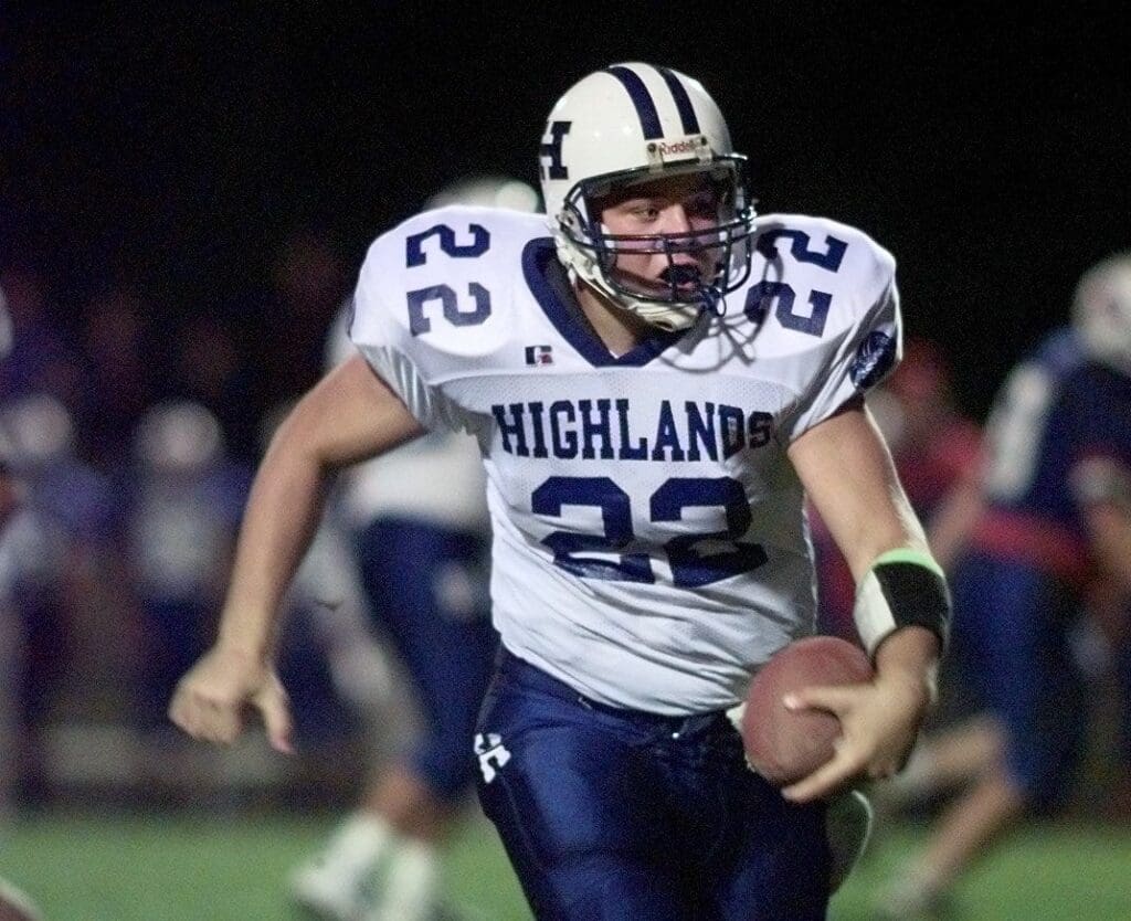 Taken Oct. 2, 1998: Highlands' quarterback Jared Lorenzen scrambles for a touchdown on the first series of plays against Conner Friday night, but the play was called back on a penalty as they played at Conner High School. Title No Title