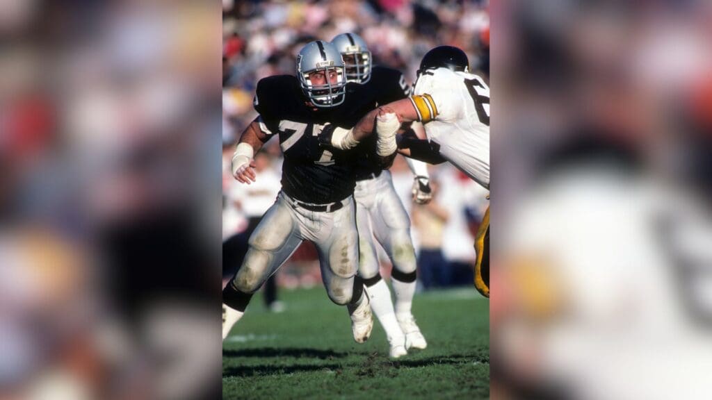 Jan 1, 1984; Los Angeles, CA, USA; FILE PHOTO; Los Angeles Raiders defensive end Lyle Alzado (77) in action against the Pittsburgh Steelers during the 1983 AFC Divisional Playoff Game at the Los Angeles Coliseum. The Raiders defeated the Steelers 38-10.
