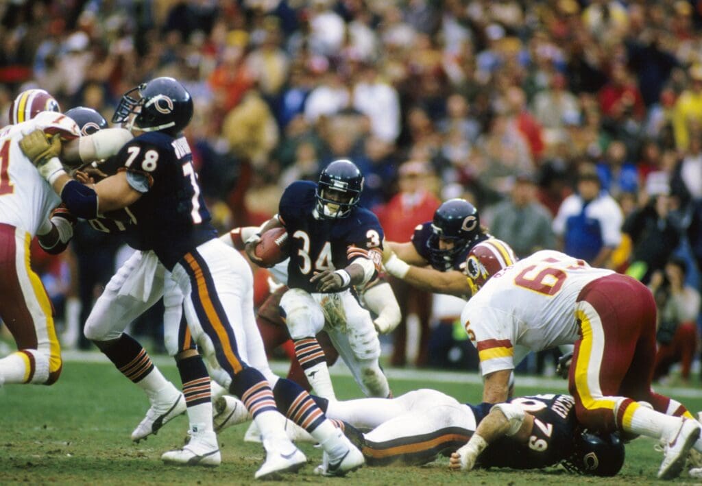 Unknown date; Washington, DC, USA; FILE PHOTO; Chicago Bears running back Walter Payton (34) carries the ball against the Washington Redskins at RFK Stadium.