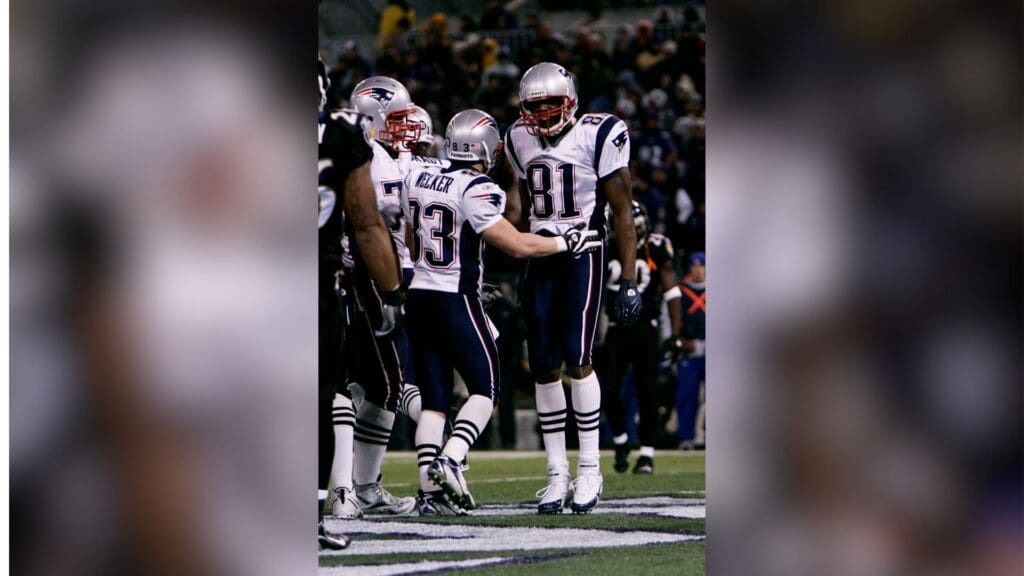 Dec 3, 2007; Baltimore, MD, USA; New England Patriots wide receiver Randy Moss (81) celebrates with wide receiver Wes Welker (83) after scoring a touchdown in the third quarter against the Baltimore Ravens at M&T Bank Stadium. New England won the game 27-24.