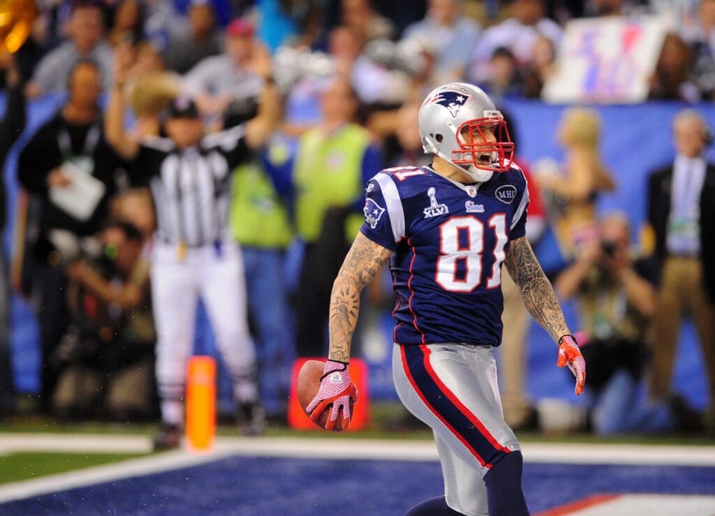 Feb 5, 2012; Indianapolis, IN, USA; New England Patriots tight end Aaron Hernandez celebrates as he scores a touchdown during Super Bowl XLVI against the New York Giants at Lucas Oil Stadium.