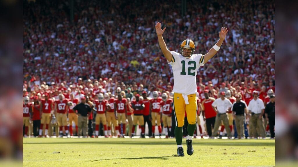 Sep 8, 2013; San Francisco, CA, USA; Green Bay Packers quarterback Aaron Rodgers (12) reacts after running back Eddie Lacy (not pictured) scored a touchdown against the San Francisco 49ers in the fourth quarter at Candlestick Park. The 49ers defeated the Packers 34-28.