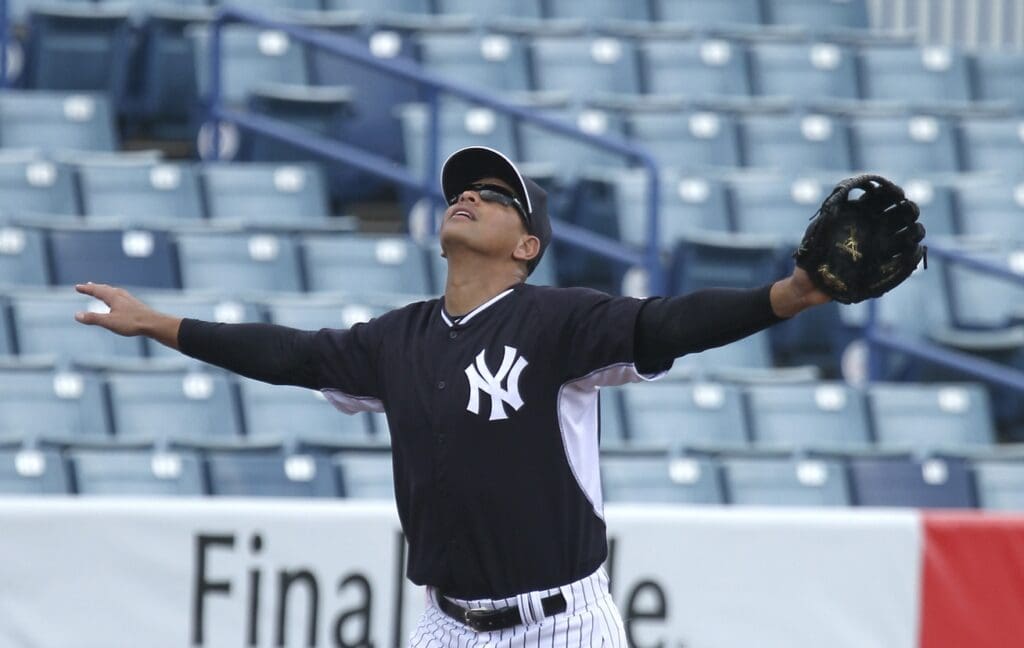 Mar 2, 2015; Tampa, FL, USA; New York Yankees third baseman Alex Rodriguez (13) calls for a fly ball during spring training workouts at George M. Steinbrenner Field.