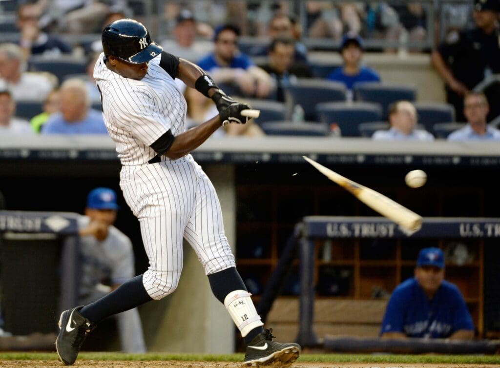 Jun 18, 2014; Bronx, NY, USA; New York Yankees batter Alfonso Soriano breaks his bat in the 3rd inning against the Toronto Blue Jays during the MLB baseball game at Yankee Stadium.