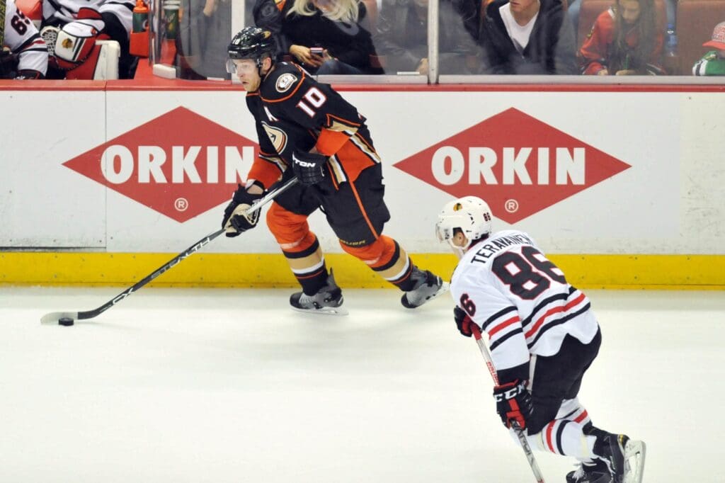 May 19, 2015; Anaheim, CA, USA; Anaheim Ducks right wing Corey Perry (10) skates with the puck against Chicago Blackhawks left wing Teuvo Teravainen (86) in the overtime period in game two of the Western Conference Final of the 2015 Stanley Cup Playoffs at Honda Center.