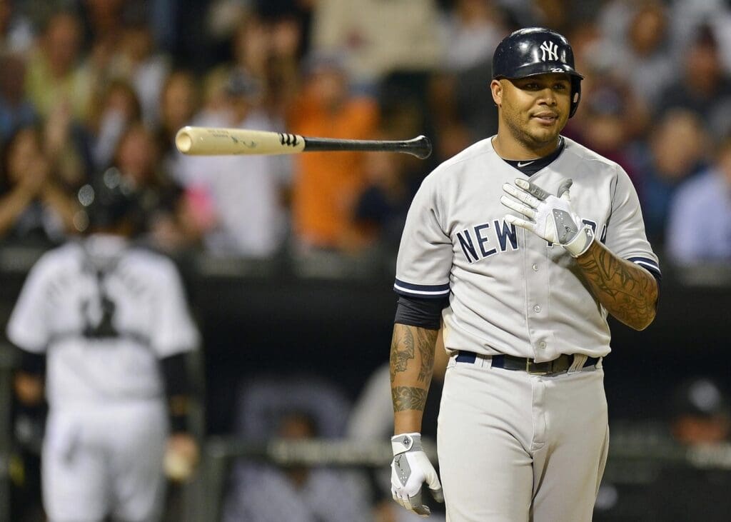 Aug 21, 2012; Chicago, IL, USA; New York Yankees left fielder Andruw Jones (22) reacts after striking out against the Chicago White Sox in the sixth at US Cellular Field