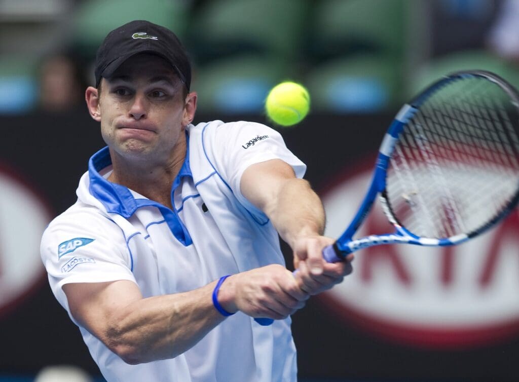 Jan 19, 2011; Melbourne, AUSTRALIA; Andy Roddick (USA) returns a shot against Igor Kunitsyn (RUS) on day three of the 2011 Australian Open in Melbourne Park.