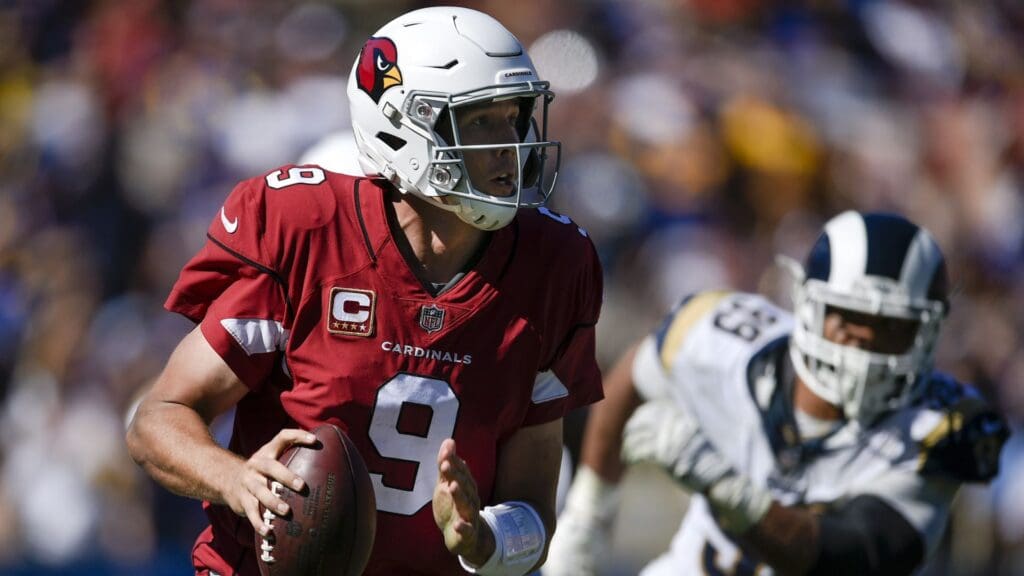 Sep 16, 2018; Los Angeles, CA, USA; Arizona Cardinals quarterback Sam Bradford (9) looks to pass the ball while being pressured by Los Angeles Rams defensive tackle Aaron Donald (99) during the second half at Los Angeles Memorial Coliseum. 