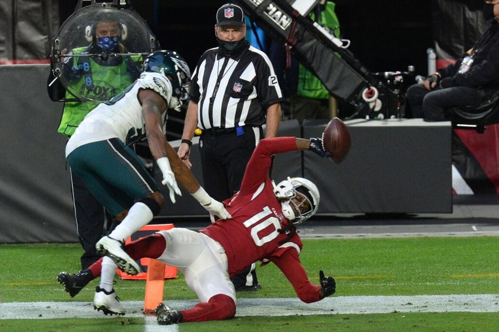 Dec 20, 2020; Glendale, Arizona, USA; Arizona Cardinals wide receiver DeAndre Hopkins (10) makes a touchdown catch against Philadelphia Eagles defensive back Michael Jacquet (38) during the second half at State Farm Stadium.