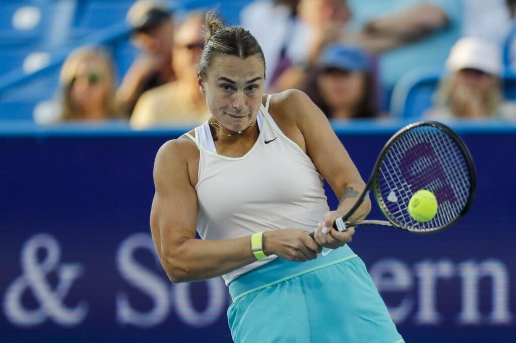 Aug 18, 2023; Mason, OH, USA; Aryna Sabalenka returns a shot against Ons Jabeur (TUN) during the Western and Southern Open tennis tournament at Lindner Family Tennis Center.