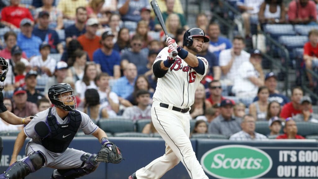 Jul 16, 2016; Atlanta, GA, USA; Atlanta Braves catcher A.J. Pierzynski (15) hits a two-run home run against the Colorado Rockies in the second inning at Turner Field.