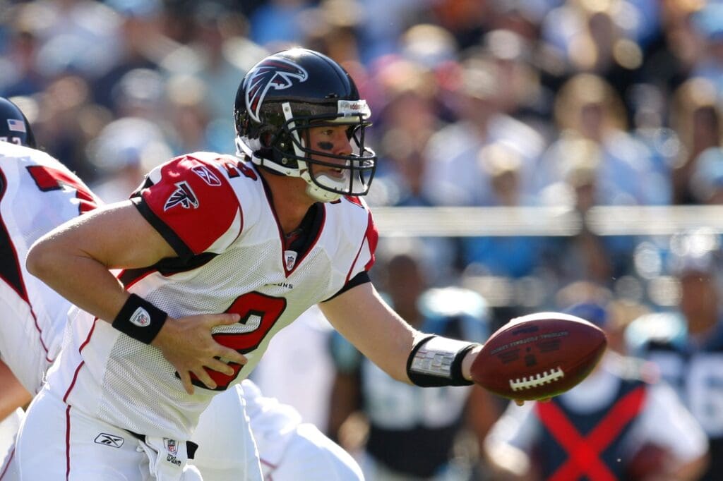 Nov 15, 2009; Charlotte, NC, USA; Atlanta Falcons quarterback Matt Ryan (2) hands the ball off at Bank of America Stadium. The Carolina Panthers defeated the Falcons 28-19.