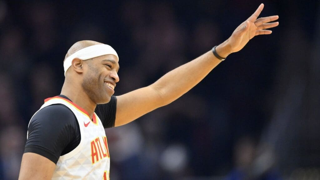 Feb 12, 2020; Cleveland, Ohio, USA; Atlanta Hawks guard Vince Carter (15) reacts after he was introduced to fans during his final game in Cleveland at Rocket Mortgage FieldHouse.