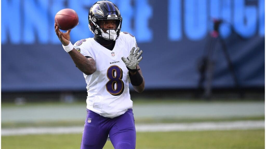 Jan 10, 2021; Nashville, Tennessee, USA; Baltimore Ravens quarterback Lamar Jackson (8) throws a pass against the Tennessee Titans during the third quarter in a AFC Wild Card playoff game at Nissan Stadium.