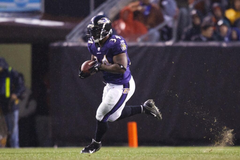 Dec 4, 2011; Cleveland, OH, USA; Baltimore Ravens running back Ricky Williams (34) runs the ball against the Cleveland Browns at Cleveland Browns Stadium.