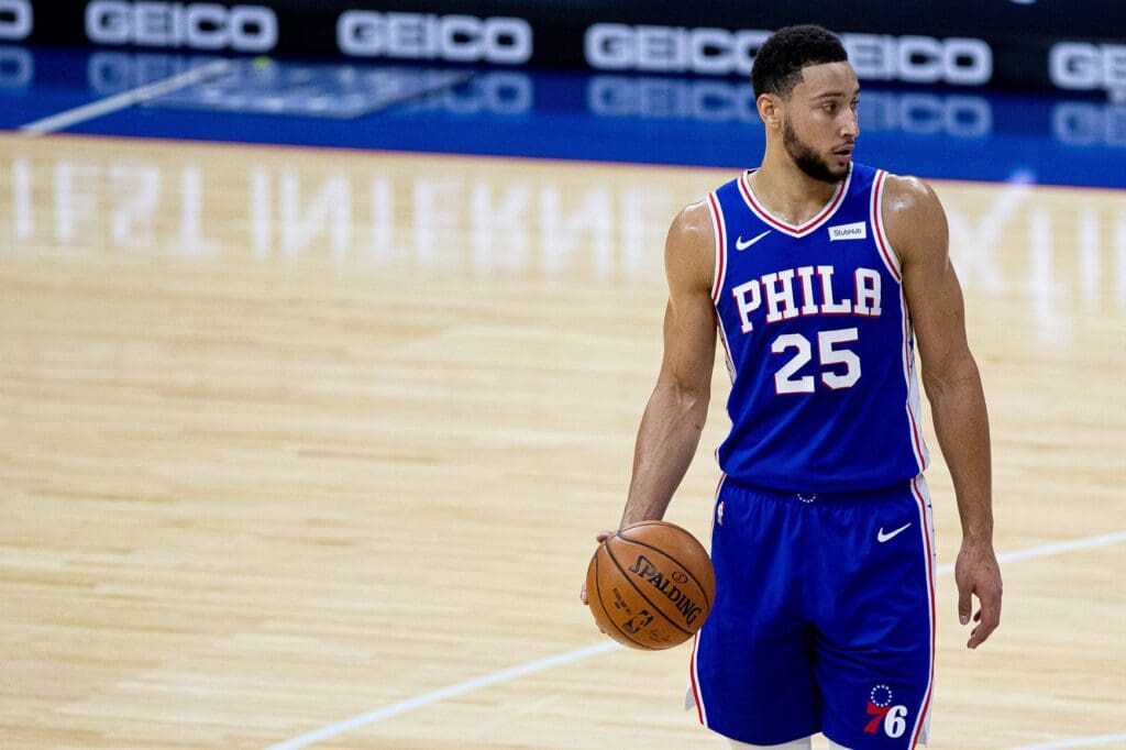 Jan 12, 2021; Philadelphia, Pennsylvania, USA; Philadelphia 76ers guard Ben Simmons (25) holds the ball against the Miami Heat during the first quarter at Wells Fargo Center.