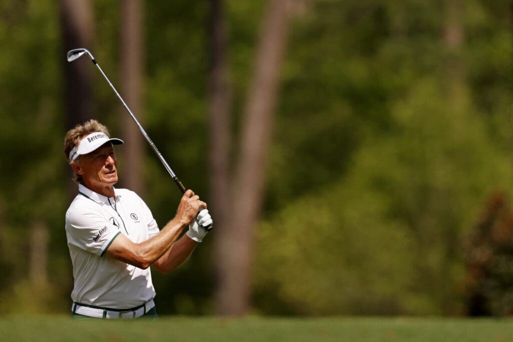 Apr 11, 2025; Augusta, Georgia, USA; Bernhard Langer watches his shot on the 12th fairway during the second round of the Masters Tournament at Augusta National Golf Club.