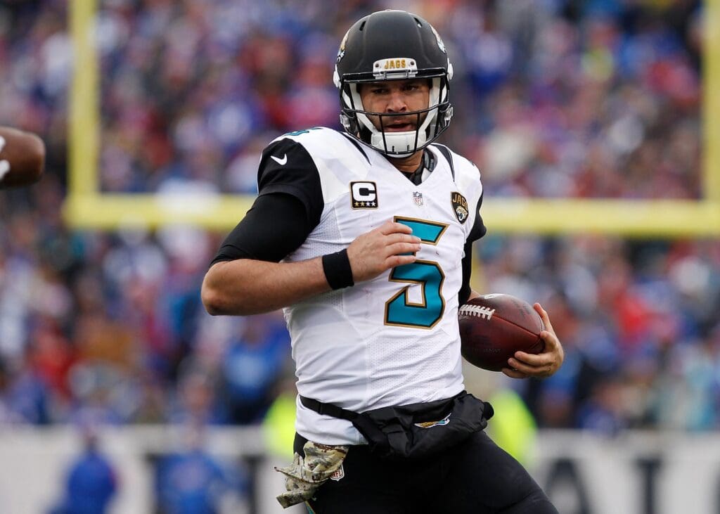 Nov 27, 2016; Orchard Park, NY, USA; Jacksonville Jaguars quarterback Blake Bortles (5) carries the ball during the second half against the Buffalo Bills at New Era Field. The Bills won 28-21.