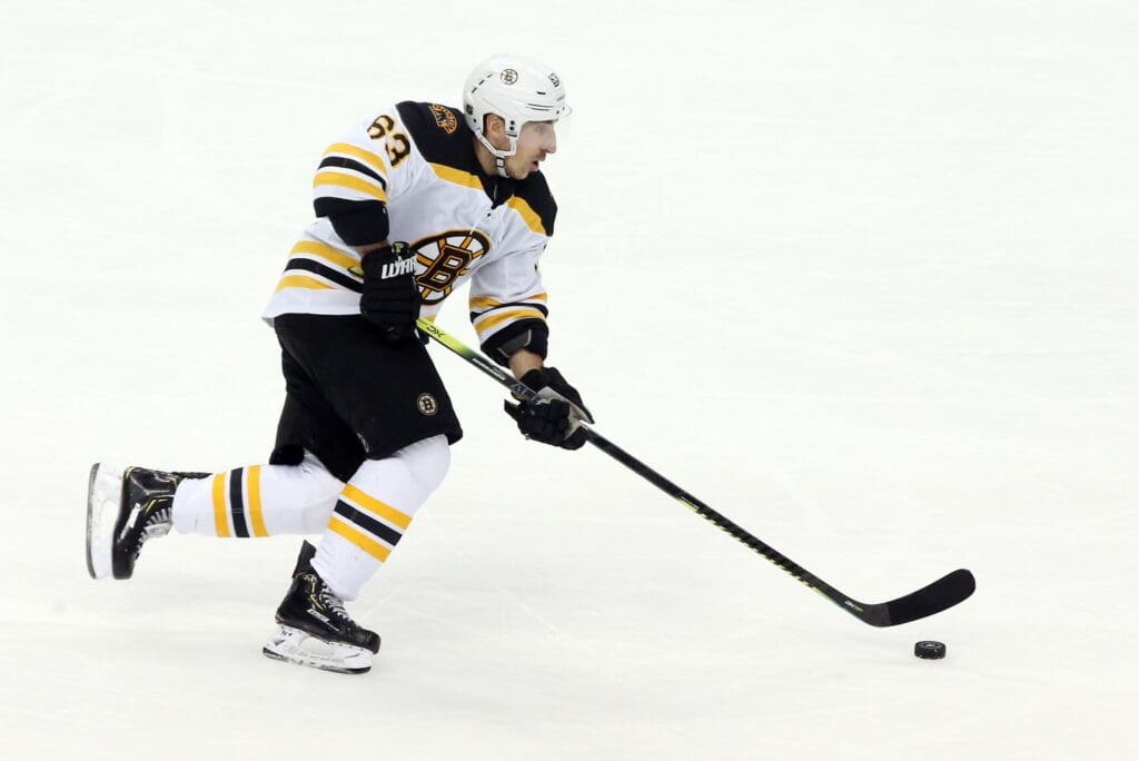 Mar 10, 2019; Pittsburgh, PA, USA; Boston Bruins left wing Brad Marchand (63) skates with the puck against the Pittsburgh Penguins during the second period at PPG PAINTS Arena. Pittsburgh won 4-2.