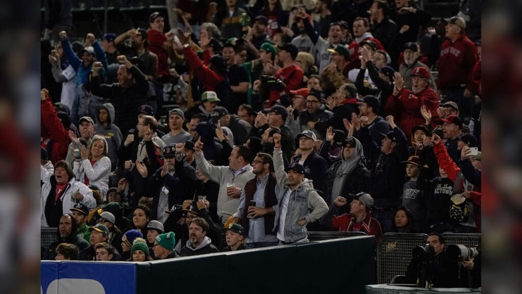 Apr 3, 2019; Oakland, CA, USA; Boston Red Sox fans cheer against the Oakland Athletics during the sixth inning at Oakland Coliseum.