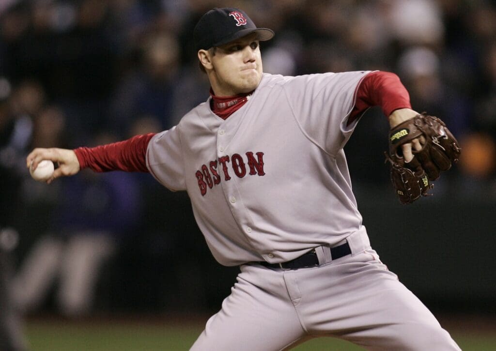 Oct 27, 2007; Denver, CO, USA; Boston Red Sox closer Jonathan Papelbon (58) delivers a pitch during the ninth inning of game 3 of the 2007 World Series against the Colorado Rockies at Coors Field. The Red Sox beat the Rockies 10-5.