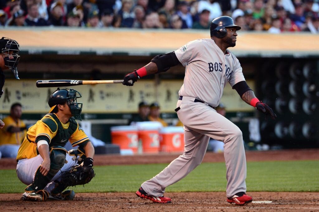 July 3, 2012; Oakland, CA, USA; Boston Red Sox designated hitter David Ortiz (34) hits a single during the fourth inning against the Oakland Athletics at O.co Coliseum.