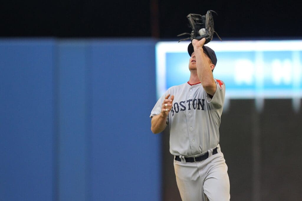 May 11, 2011; Toronto, ON, Canada; Boston Red Sox right fielder J.D. Drew (7) catches a fly ball hit by Toronto Blue Jays Aaron Hill (not pictured) at the Rogers Centre.