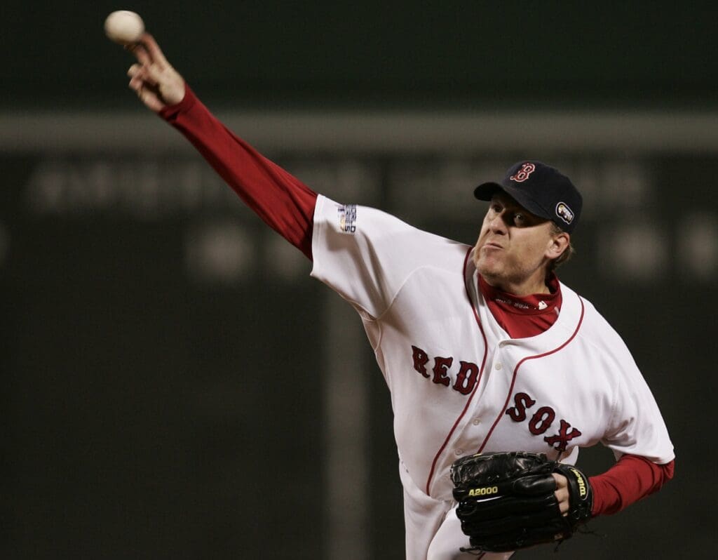 Oct 25, 2007; Boston, MA, USA; Boston Red Sox starting pitcher Curt Schilling (38) delivers a pitch during game 2 of the 2007 World Series against the Colorado Rockies at Fenway Park.