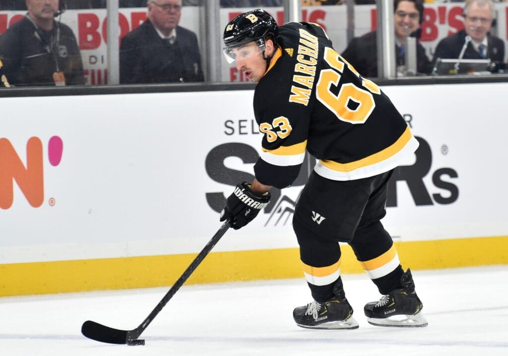 Dec 21, 2019; Boston, Massachusetts, USA; Boston Bruins left wing Brad Marchand (63) skates with the puck during the first period against the Nashville Predators at TD Garden.