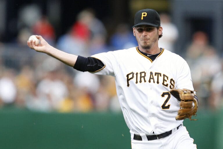 August 4, 2011; Pittsburgh,PA, USA: Pittsburgh Pirates shortstop Brandon Wood (2) throws to first base against the Chicago Cubs during the third inning at PNC Park.