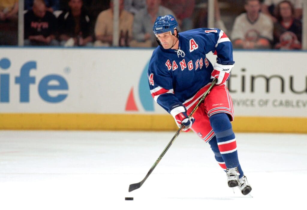 Sep 25, 2006; New York City, NY, USA; New York Rangers left wing Brendan Shanahan (14) handles the puck against the New York Islanders at Madison Square Garden.