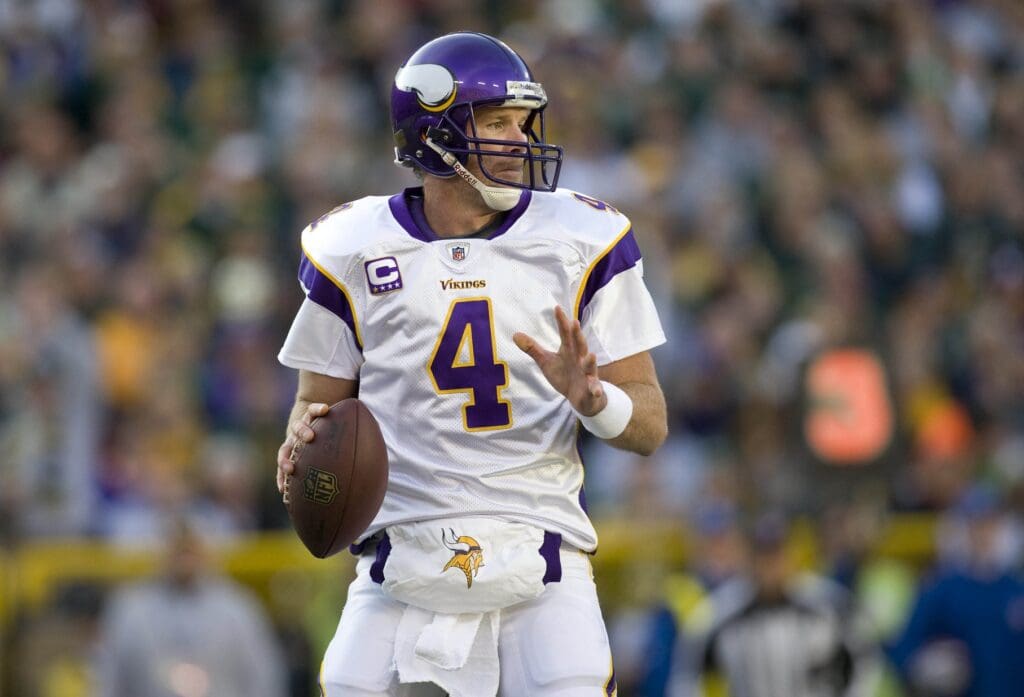 Nov 1, 2009; Green Bay, WI, USA; Minnesota Vikings quarterback Brett Favre (4) drops back to pass during the game against the Green Bay Packers at Lambeau Field. The Vikings defeated the Packers 38-26.
