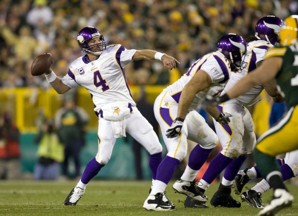Nov 1, 2009; Green Bay, WI, USA; Minnesota Vikings quarterback Brett Favre (4) throws a pass during the game against the Green Bay Packers at Lambeau Field. The Vikings defeated the Packers 38-26.