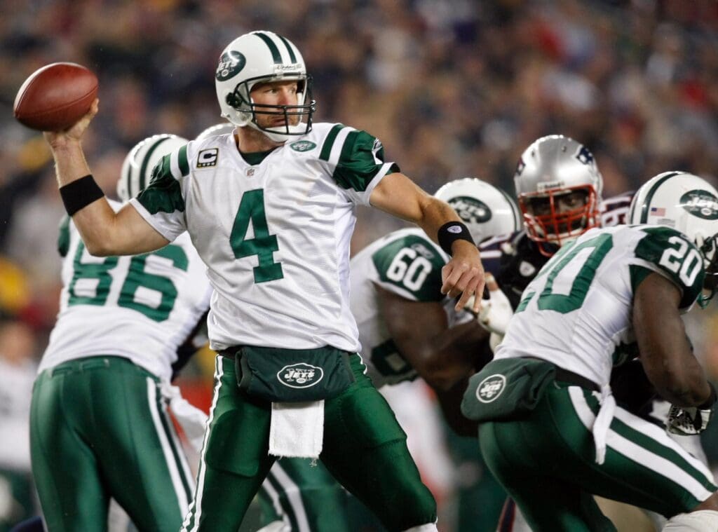 Nov 13, 2008; Foxboro, MA, USA; New York Jets quarterback Brett Favre (4) throws a pass in the third quarter against the New England Patriots at Gillette Stadium. The Jets defeated the Patriots 34-31.