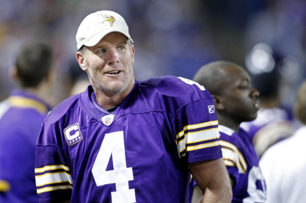 Nov 29, 2009; Minneapolis, MN, USA; Minnesota Vikings quarterback Brett Favre (4) smiles along the sidelines after leaving the game against the Chicago Bears in the fourth quarter at the Metrodome. Vikings win 36-10.