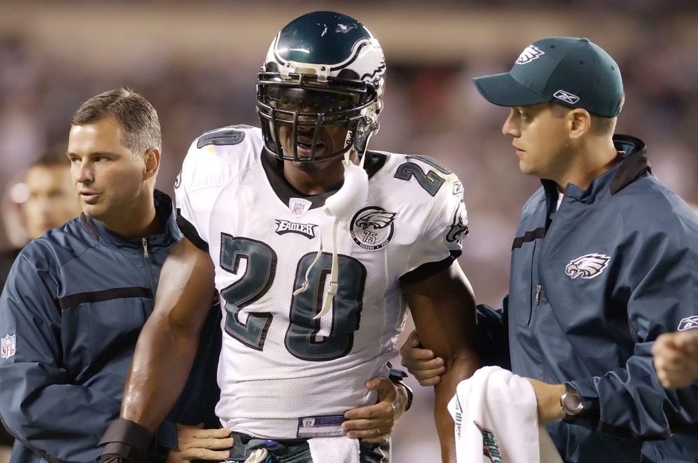 September 17, 2007; Philadelphia, PA USA; Philadelphia Eagles safety Brian Dawkins is helped off field after being injured during the game against the Washington Redskins at Lincoln Financial Field