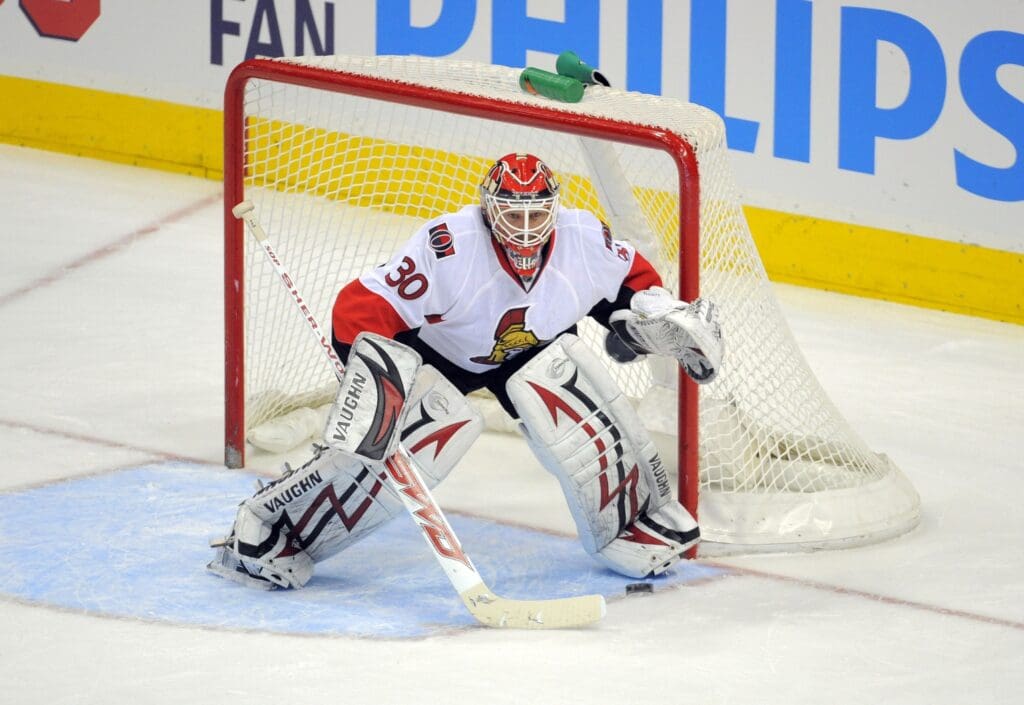 Jan 14, 2009; Atlanta, GA, USA; Ottawa Senators goalie Brian Elliott (30) waits to make a save on an Atlanta Thrashers shot on goal in the first period at Philips Arena.