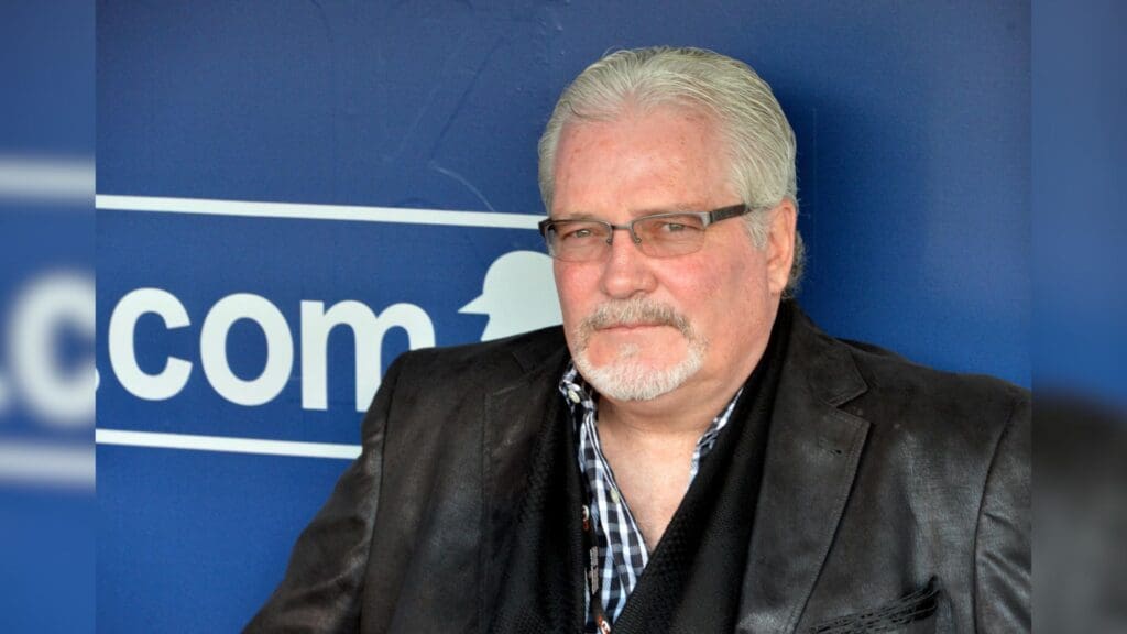 Oct 22, 2014; Kansas City, MO, USA; San Francisco Giants general manager Brian Sabean sits in the dugout before game two of the 2014 World Series against the Kansas City Royals at Kauffman Stadium.