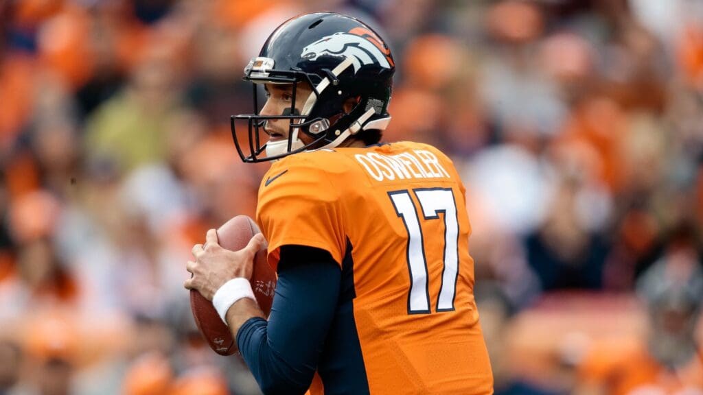 Nov 19, 2017; Denver, CO, USA; Denver Broncos quarterback Brock Osweiler (17) drops back to pass in the first quarter against the Cincinnati Bengals at Sports Authority Field at Mile High.
