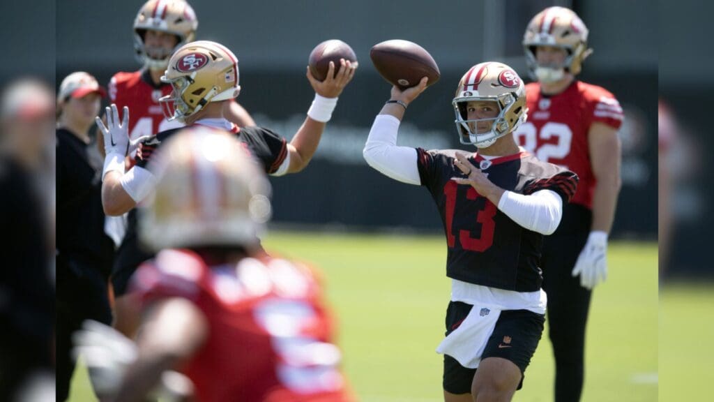 Jun 10, 2025; Santa Clara, CA, USA; San Francisco 49ers quarterbacks Mac Jones and Brock Purdy (13) work on passing drills during an OTA at Levi's Stadium.