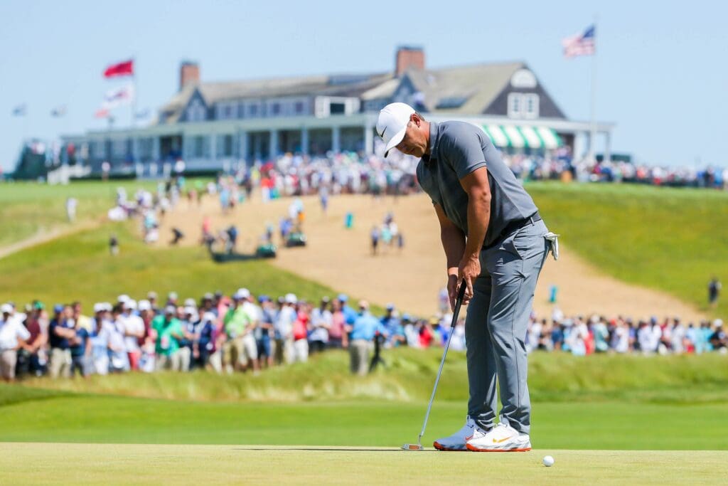 Jun 17, 2018; Southampton, NY, USA; Brooks Koepka putts the first green during the final round of the U.S. Open golf tournament at Shinnecock Hills GC - Shinnecock Hills Golf C.